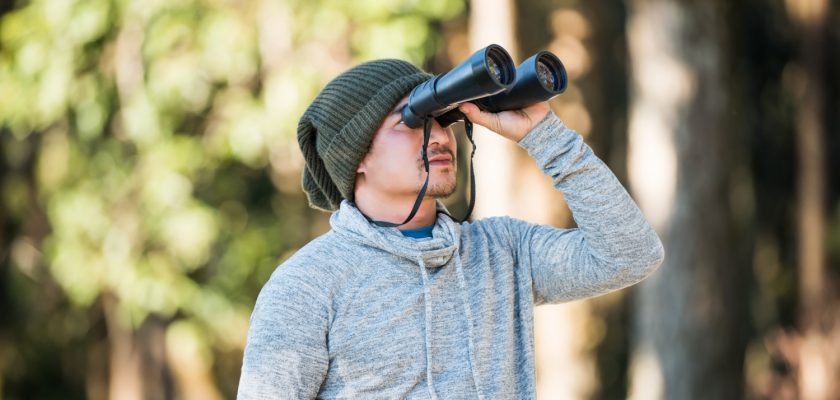 how to hold binoculars steady